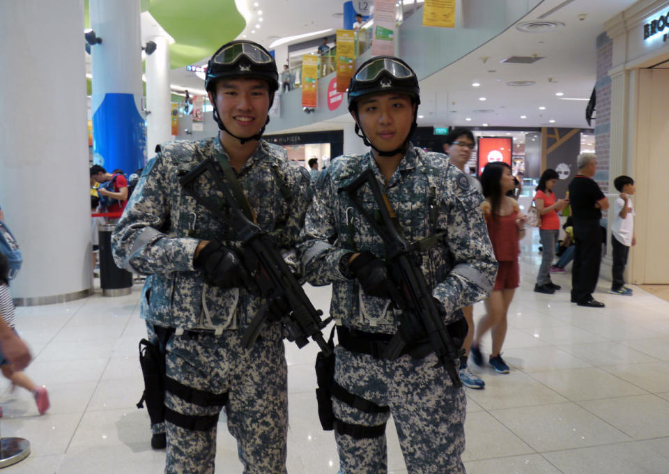 Members of the Accompanying Sea Security Team in full battle gear. (Photo: Dhany Osman/Yahoo Newsroom)