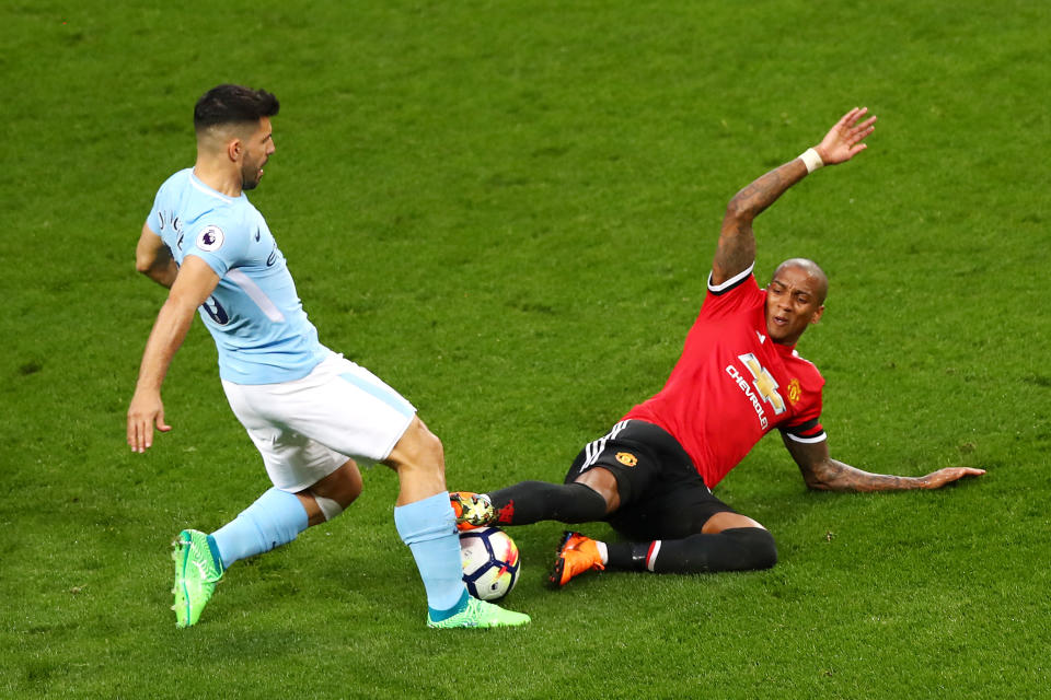 Ashley Young brings down Sergio Aguero in the Manchester derby but no penalty is given. Manchester Utd win the game and City must wait to win the title. (7 April 2018)