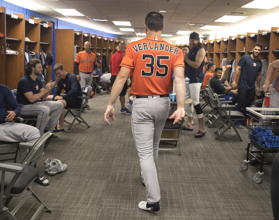 Houston Astros starter Justin Verlander walks through the clubhouse after pitching a no-hitter against the Toronto Blue Jays in a baseball game in Toronto, Sunday, Sept. 1, 2019. (Fred Thornhill/The Canadian Press via AP)