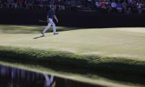 Jordan Spieth of the U.S. walks onto the 15th green in third round play during the 2017 Masters golf tournament at Augusta National Golf Club in Augusta, Georgia, U.S., April 8, 2017. REUTERS/Lucy Nicholson