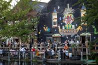 <p>The newest addition to Hackney's lively hangout spot on the River Lea, <a href="https://www.instagram.com/two_moreyears/" rel="nofollow noopener" target="_blank" data-ylk="slk:Two More Years;elm:context_link;itc:0;sec:content-canvas" class="link ">Two More Years</a> has DJs every weekend and food from <span>Burger and Beyond</span>. As east London as it gets, there's an extensive menu of natural, organic and biodynamic wines and ice-cold craft beer from sustainable brewery, Purity. <br></p>