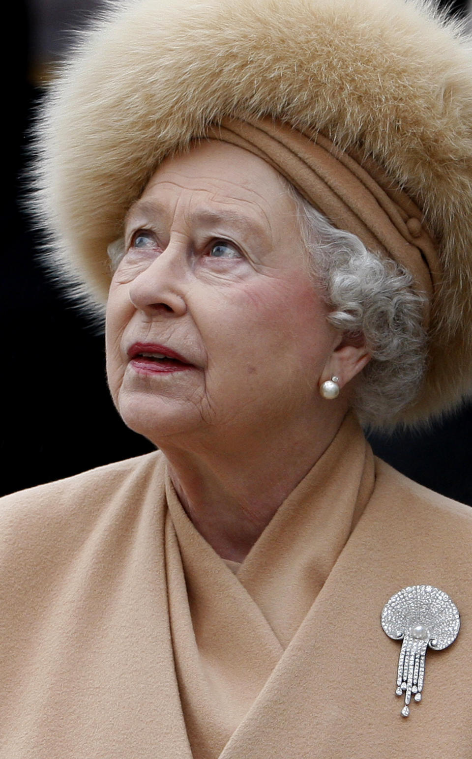 FILE - Britain's Queen Elizabeth II attends a ceremony to unveil a memorial to Queen Elizabeth, the Queen Mother, on the Mall in London, on Feb. 24, 2009. (AP Photo/Kirsty Wigglesworth, File)