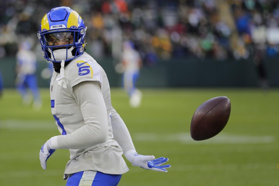 Los Angeles Rams' Jalen Ramsey warms up before an NFL football game against the Green Bay Packers Sunday, Nov. 28, 2021, in Green Bay, Wis. (AP Photo/Aaron Gash)