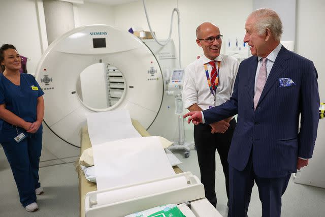 <p>SUZANNE PLUNKETT/POOL/AFP via Getty Images</p> King Charles (right) visits the University College Hospital Macmillan Cancer Centre in London on April 30, 2024.
