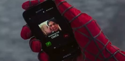 Peter holding his ringing cell phone when Gwen is calling in "The Amazing Spider-Man 2"