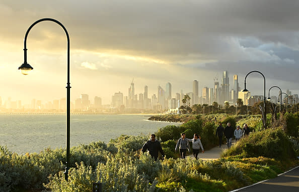 Melburnians exercise along Elwood Beach in Melbourne, Australia. 