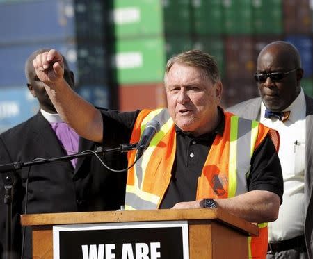 President of the International Brotherhood of Teamsters labour union James P. Hoffa speaks at a news conference regarding truck drivers striking against what they say are misclassification of workers at the Ports of Long Beach and Los Angeles in Long Beach, California October 27, 2015. REUTERS/Bob Riha Jr.