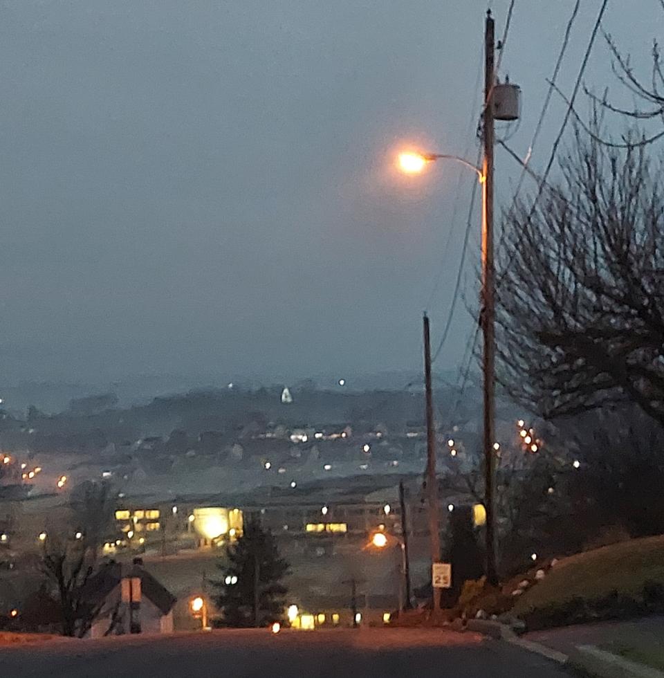 The illuminated tree at the home of Greg and Karen Ramey off Route 997 is visible in the distance at the center of this photo Karen Ramey took from the hill behind WellSpan Waynesboro Hospital.