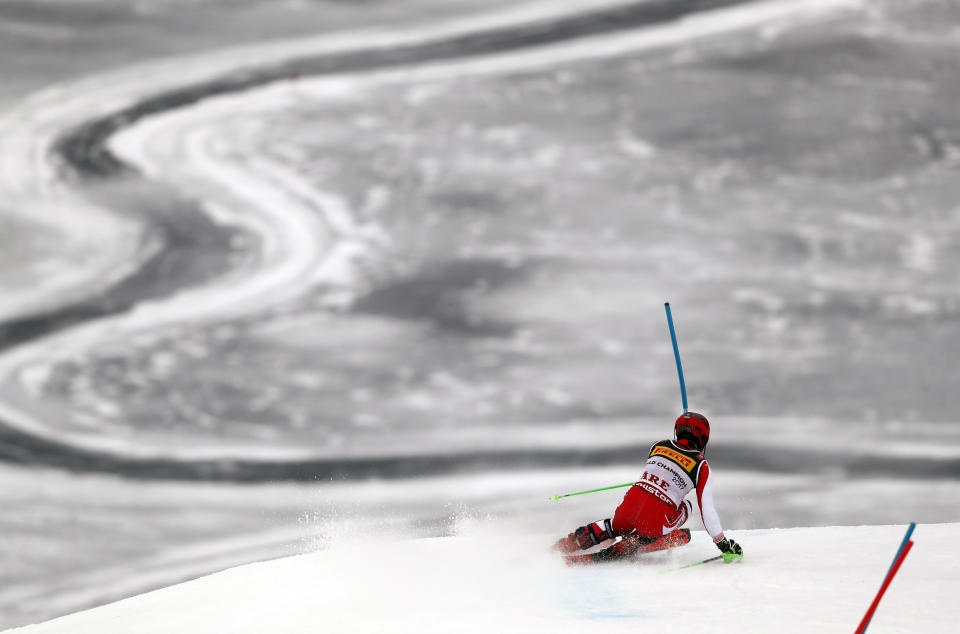 Austria's Marcel Hirscher speeds down the course on his way to win the men's slalom, at the alpine ski World Championships in Are, Sweden, Sunday, Feb. 17, 2019. (AP Photo/Gabriele Facciotti)