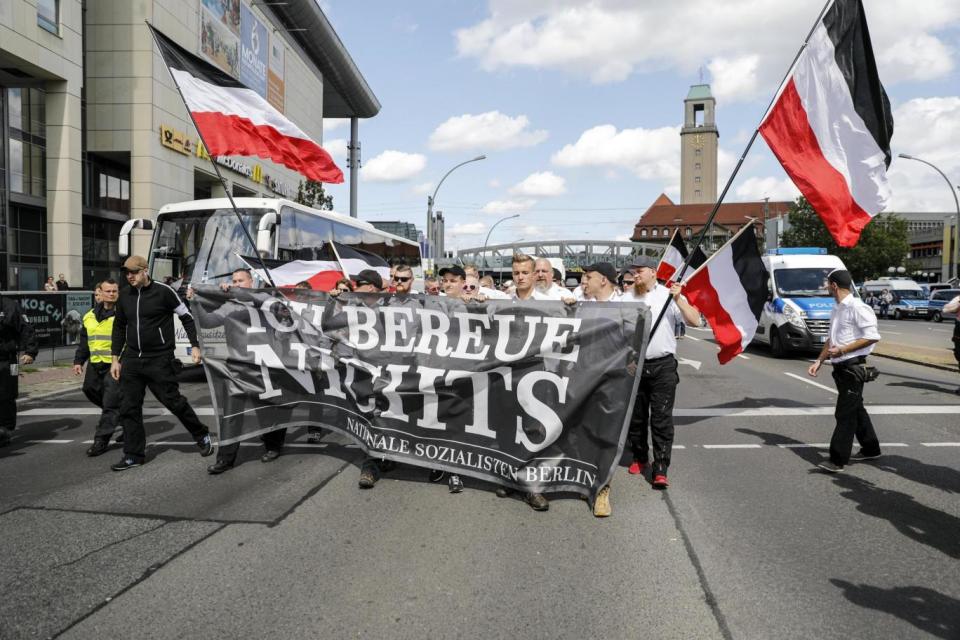 Supporters of far-right wing and neo-Nazi organisations march through Berlin (EPA)