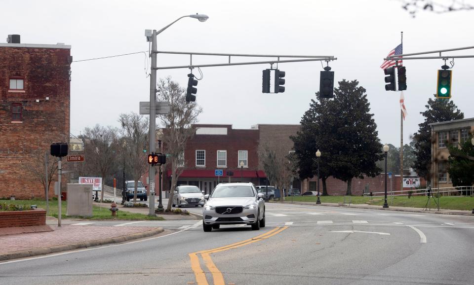 U.S. Highway 90 through downtown Milton will likely be widened to four lanes at some point in the future, but until that happens some local business owners hope to develop some of the roadside property in the planned construction zone.