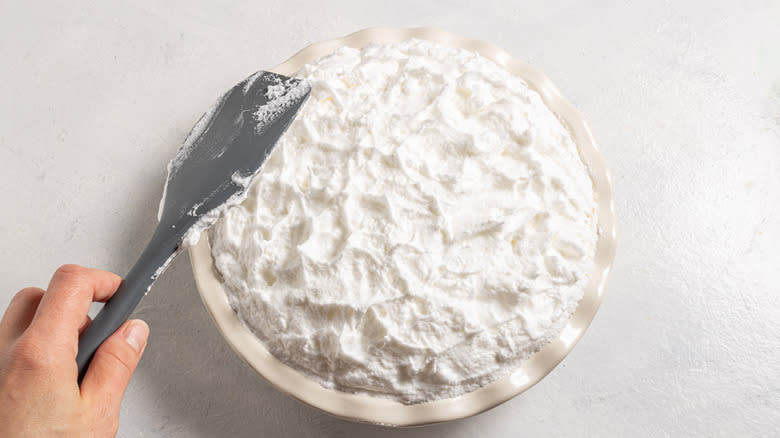 Spreading meringue over a pie