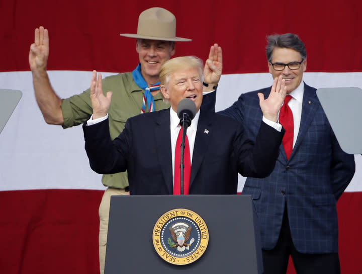 President Trump with former boys scouts Interior Secretary Ryan Zinke, left, and Energy Secretary Rick Perry, at the 2017 National Boy Scout Jamboree, July 24, 2017. (Photo: Steve Helber/AP)