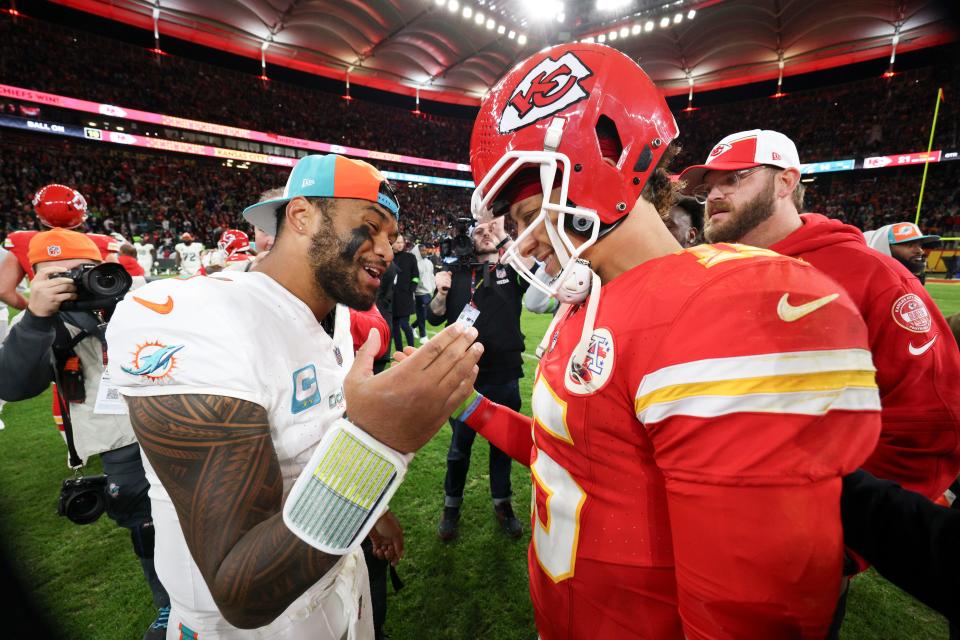 Nov 5, 2023; Frankfurt, Germany, ; Kansas City Chiefs quarterback Patrick Mahomes (15) greets Miami Dolphins quarterback Tua Tagovailoa (1) after an NFL International Series game at Deutsche Bank Park. Mandatory Credit: Nathan Ray Seebeck-USA TODAY Sports