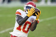 Kansas City Chiefs wide receiver Tyreek Hill (10) pulls in a 44-yard touchdown reception from quarterback Patrick Mahomes during the first half of an NFL football game against the Tampa Bay Buccaneers Sunday, Nov. 29, 2020, in Tampa, Fla. (AP Photo/Jason Behnken)