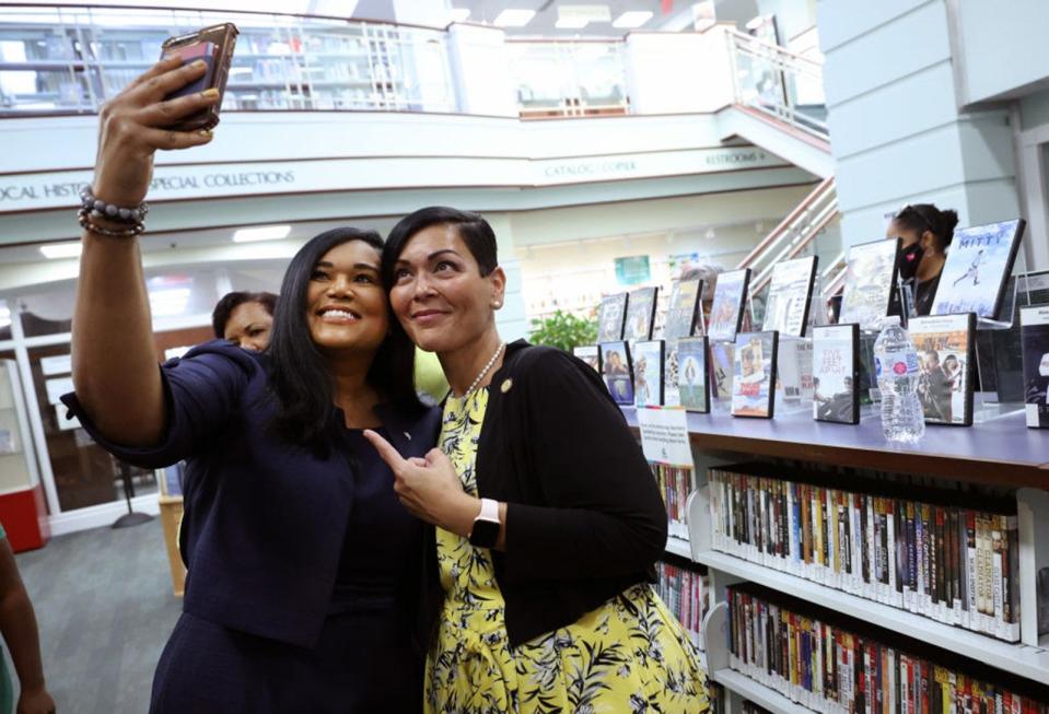 State Rep. Shawn Thierry, D-Houston, takes a photo with Hala Ayala, the Democratic nominee for Virginia lieutenant governor, on July 16 as they visit the Kate Waller Barrett Branch Library. It is the site of the 1939 Alexandria Library sit-in, where five Black men were arrested for attempting to register for a library card in Alexandria, Va.