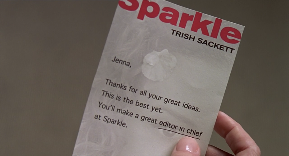 Jenna holds a letter from rival magazine Sparkle that reveals she is the employee that's been sabotaging Poise magazine all along