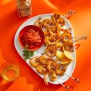 <p>Fire up the grill for this <a href="https://www.goodhousekeeping.com/food-recipes/easy/g122/easy-appetizers/" rel="nofollow noopener" target="_blank" data-ylk="slk:easy appetizer;elm:context_link;itc:0;sec:content-canvas" class="link ">easy appetizer</a>! You only need a few ingredients to put together this flavorful snack everyone will love. </p><p>Get the <a href="https://www.goodhousekeeping.com/food-recipes/a39752888/grilled-shrimp-cocktail-recipe/" rel="nofollow noopener" target="_blank" data-ylk="slk:Grilled Shrimp Cocktail recipe;elm:context_link;itc:0;sec:content-canvas" class="link "><strong>Grilled Shrimp Cocktail recipe</strong></a>. </p><p><strong>RELATED:</strong> <a href="https://www.goodhousekeeping.com/food-recipes/easy/g3580/easy-shrimp-recipes/" rel="nofollow noopener" target="_blank" data-ylk="slk:30 Seriously Easy Shrimp Recipes;elm:context_link;itc:0;sec:content-canvas" class="link ">30 Seriously Easy Shrimp Recipes</a></p>