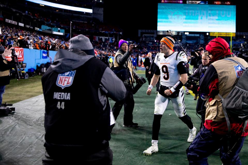 Cincinnati Bengals quarterback Joe Burrow (9) celebrates after an NFL divisional playoff football game, Saturday, Jan. 22, 2022, at Nissan Stadium in Nashville, Tenn. Cincinnati Bengals defeated Tennessee Titans 19-16.