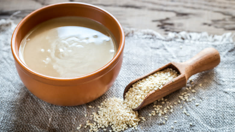 Tahini in bowl and seeds