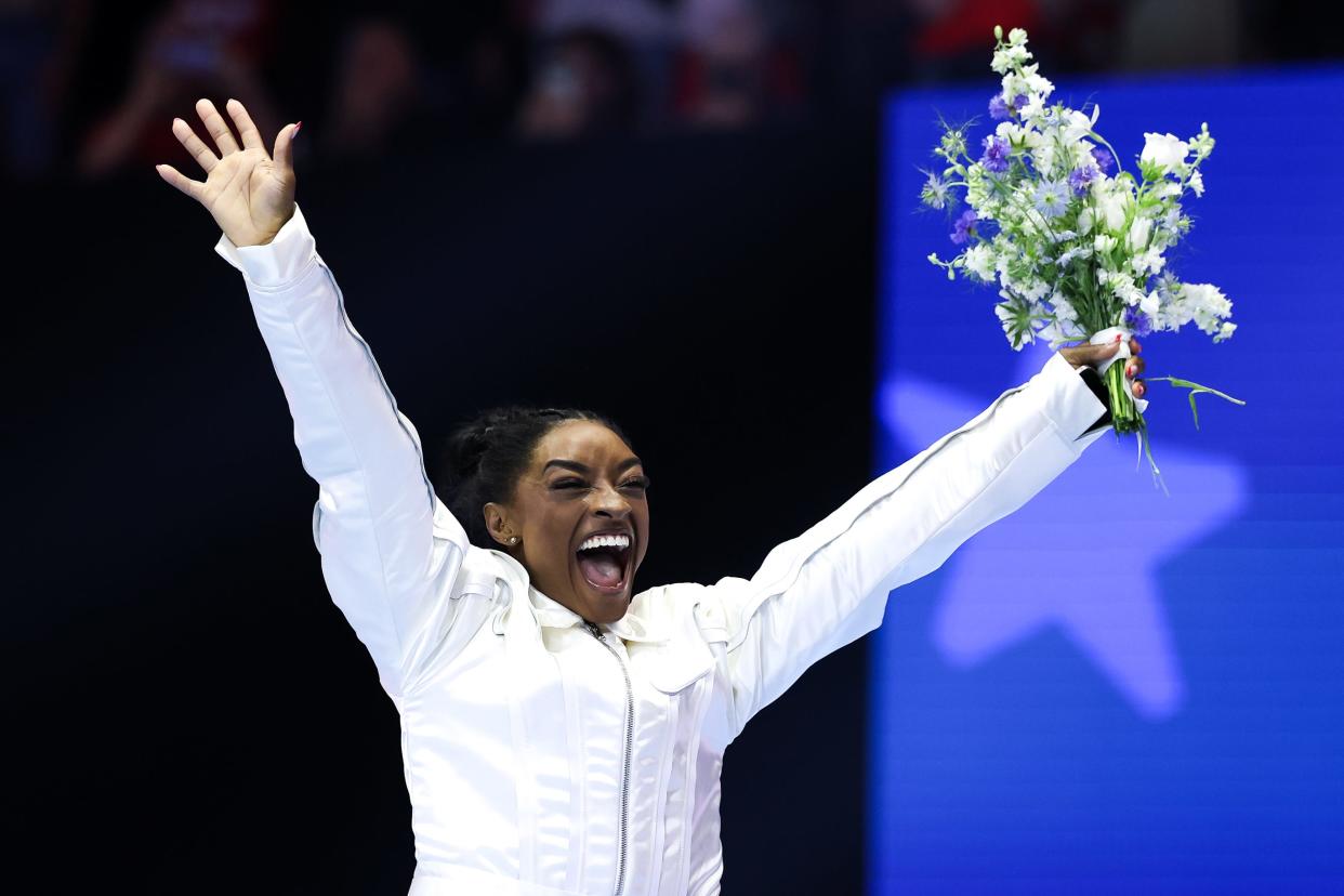 Simone Biles celebrates her selection to the U.S. Olympic gymnastics team.