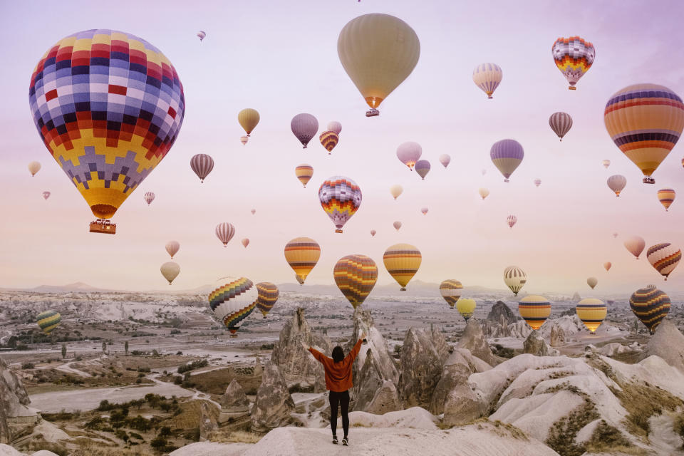 Hot air balloons flying over Cappadocia, Turkey.