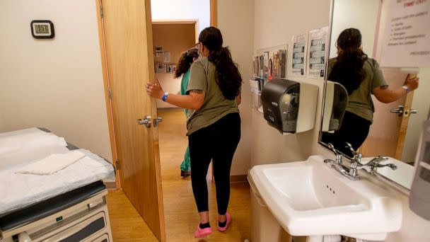 PHOTO: A 25-year-old woman leaves the exam room after receiving medication to terminate her pregnancy in Albuquerque, N.M., June 23, 2022. (Los Angeles Times via Getty Images, FILE)