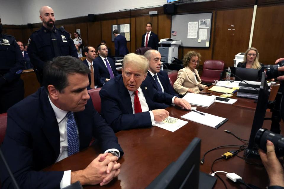 Former U.S. President Donald Trump appears with his lawyers Todd Blanche, Emil Bove and Susan Necheles for his hush money trial at Manhattan Criminal Court in New York, U.S., May 28, 2024.