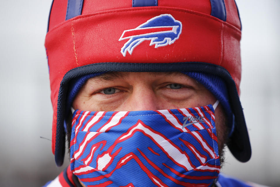 A Buffalo Bills fan arrives at Bills Stadium for an NFL wild-card playoff football game against the Indianapolis Colts Saturday, Jan. 9, 2021, in Orchard Park. (AP Photo/Jeffrey T. Barnes)