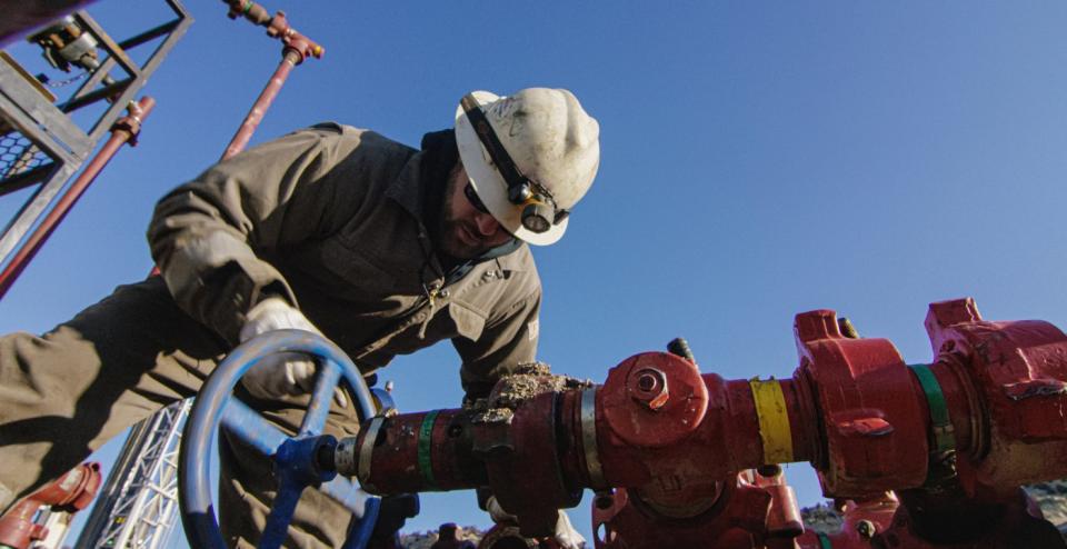 An oil field worker.