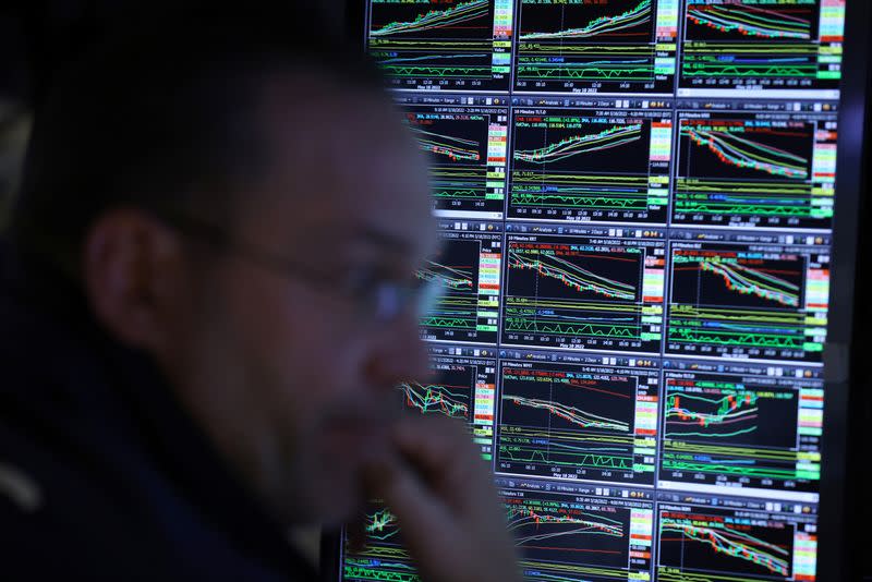 A trader works on the trading floor at the New York Stock Exchange (NYSE) in Manhattan, New York City