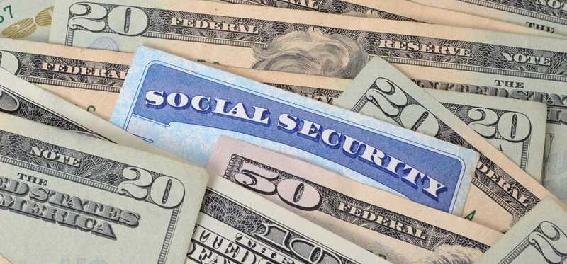 Social security cards and money.