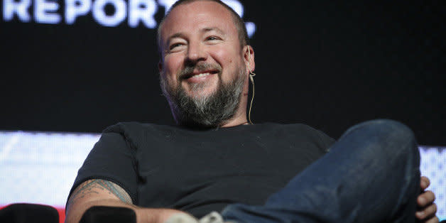 IMAGE DISTRIBUTED FOR PROMAXBDA - Shane Smith, founder and CEO of VICE, smiles in an interview with David Carr, The New York Times culture reporter, and Tom Freston, principal of Firefly3, not pictured, at the PromaxBDA #WTFuture Conference, Tuesday, June 10, 2014, in New York. (John Minchillo/AP Images for PromaxBDA) (Photo: )