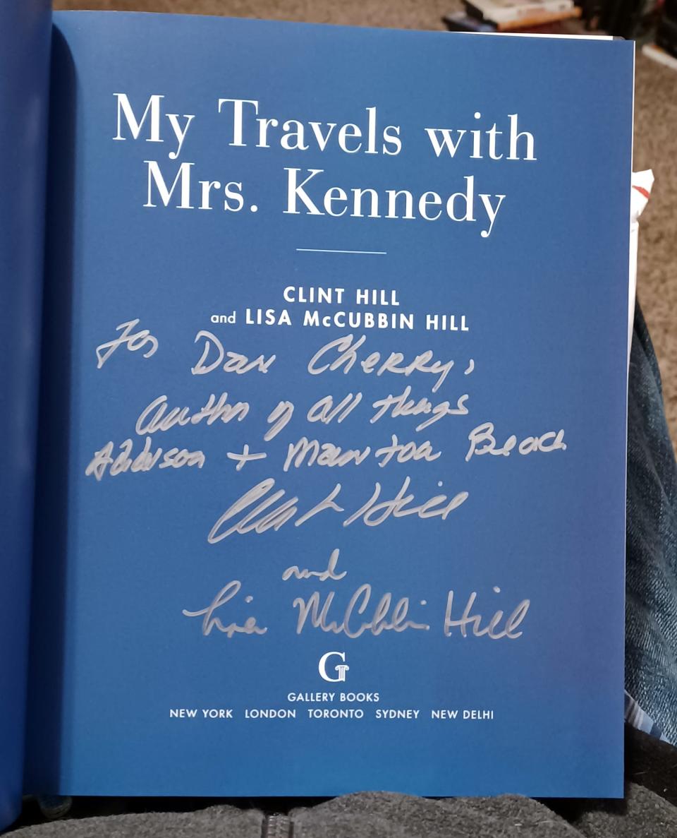 Authors Clint Hill and Lisa McCubbin Hill personalized a copy of their new book, "My Travels with Mrs. Kennedy," to Daily Telegram history columnist Dan Cherry. Clint Hill was part of first lady Jackie Kennedy's Secret Service detail.
