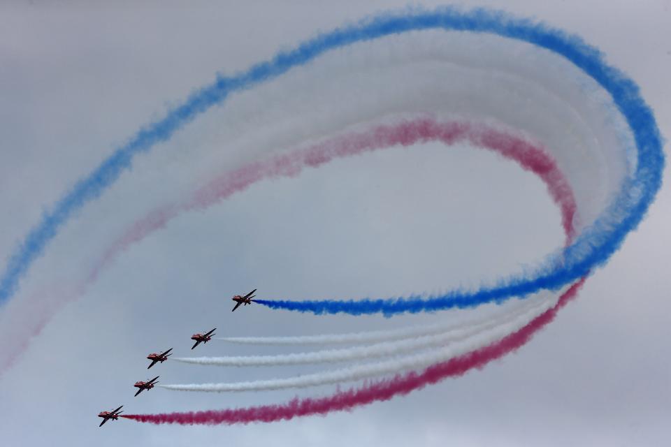 The Royal Air Force aerobatic team, the Red Arrows, perform during The Royal International Air Tattoo at the RAF in Fairford