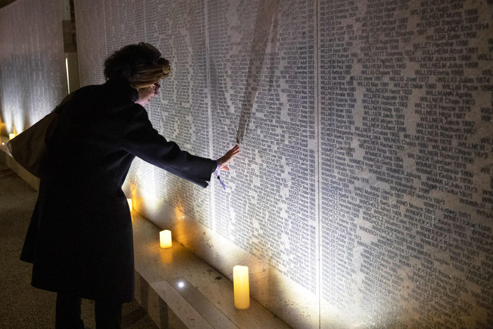 memorial shoah names memorial candlelight respect peaceful (Lisa Leutner / AP file)