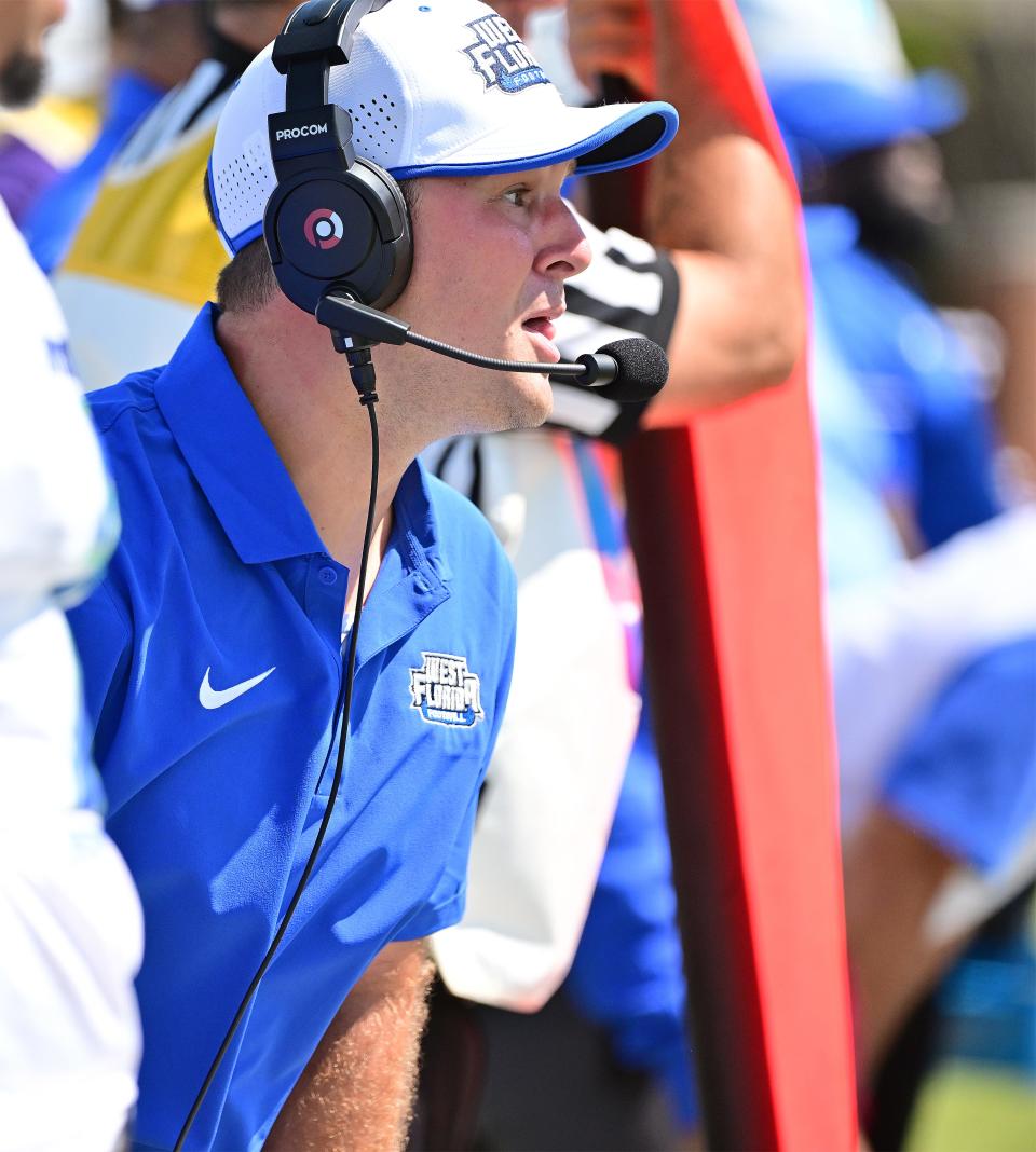 University of West Florida football head coach Kaleb Nobles watches a play unfold during the Argos' 35-3 win over McKendree University on Saturday, Sept. 9, 2023, at Leemon Field in Lebanon, Illinoid.