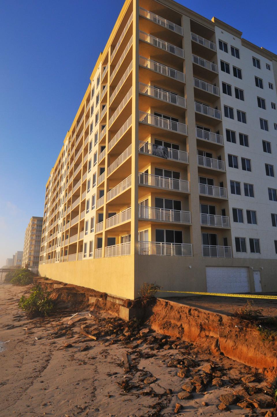 The Oceana Oceanfront Condominium north tower in Satellite Beach glows in the early morning sun Friday.