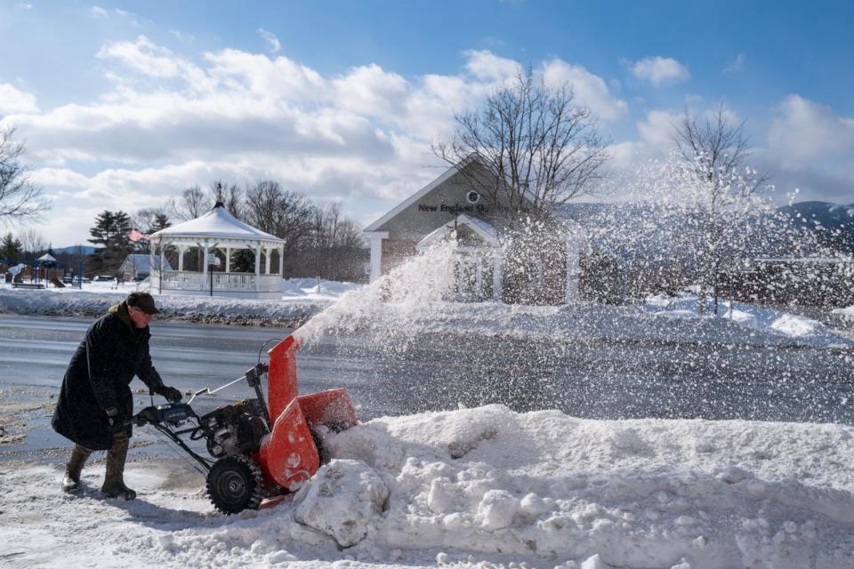 PHOTO: A man clears snow from a sidewalk on January 17, 2024 in North Conway, N.H. (Spencer Platt/Getty Images, FILE)