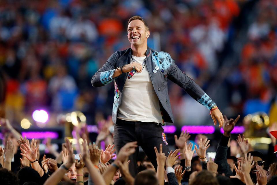 SANTA CLARA, CA - FEBRUARY 07: Chris Martin of Coldplay performs during the Pepsi Super Bowl 50 Halftime Show at Levi's Stadium on February 7, 2016 in Santa Clara, California. (Photo by Ezra Shaw/Getty Images)