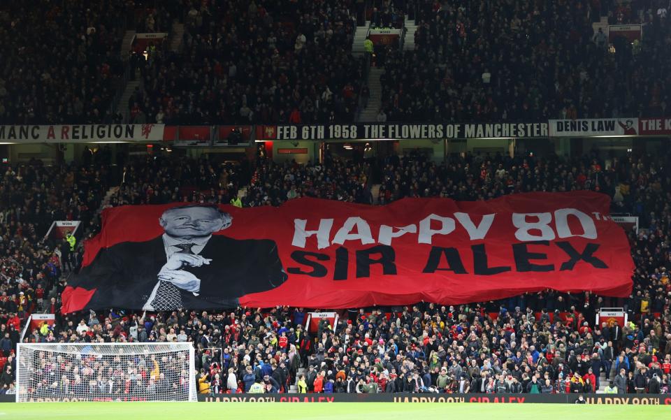 A banner which reads 'Happy 80th Sir Alex' is seen inside the stadium during the Premier League match between Manchester United and Burnley - Clive Brunskill/Getty Images