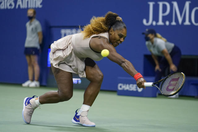 Serena Williams throws her racket after losing the second set tiebreak to  Victoria Azarenka of Belarus in the Woman's Final in Arthur Ashe Stadium at  the U.S. Open Tennis Championships at the