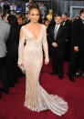 <div class="caption-credit"> Photo by: Getty Images</div><div class="caption-title">JLo at the Oscars</div>The only other Latina on Forbes' "The Best Dressed at the Oscars" list was diva Jennifer Lopez who wore a creamy gown from Zuhair Murad- one of her favorite designers. This fashionista was actually kept away from many of this year's glamorous red carpets as she traveled the world for her international music tour.