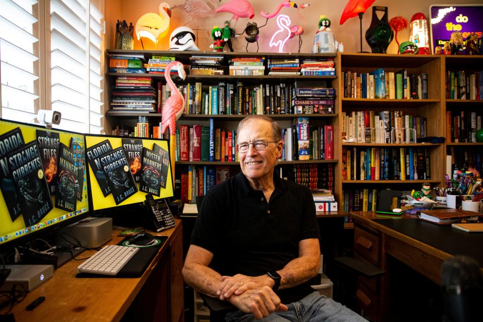 Naples author Jeff Bruce sits for a portrait in his  Naples home. He has written five books in the Alex Strange series, all of them skewed toward life in Southwest Florida. His book "Get Strange" won the Florida Mystery Writers Association book award this year. 