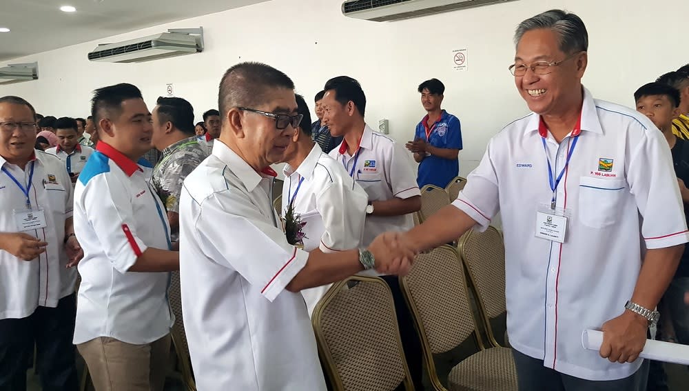 Datuk Seri Dr Maximus Ongkili (centre) is said to be recuperating from ailments brought on by exhaustion, with Radin tasked with leading PBS’ preparation for the election. — Bernama pic