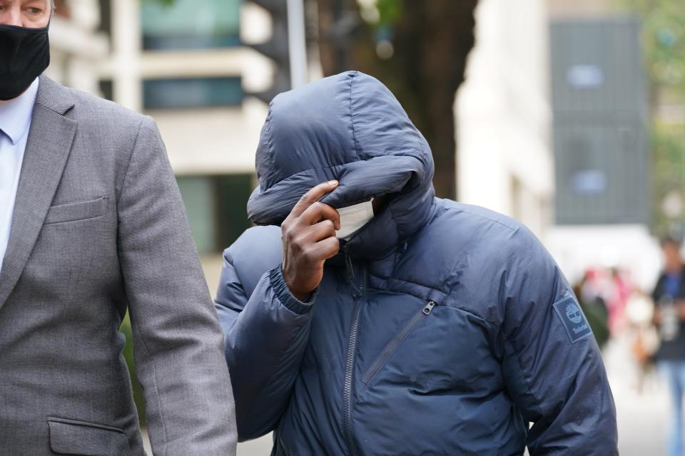 Coldstream Guard Rajon Graham covered his face at Westminster magistrates court (PA)