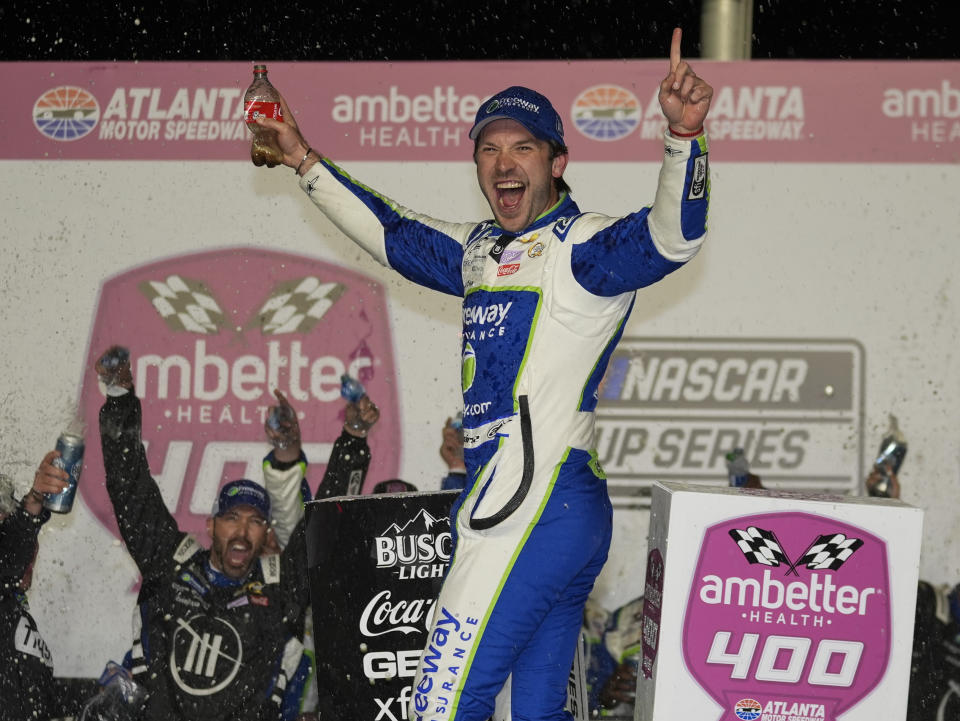 Daniel Suarez reacts after winning the NASCAR auto race at Atlanta Motor Speedway Sunday, Feb. 25, 2024, in Hampton , Ga. (AP Photo/John Bazemore)