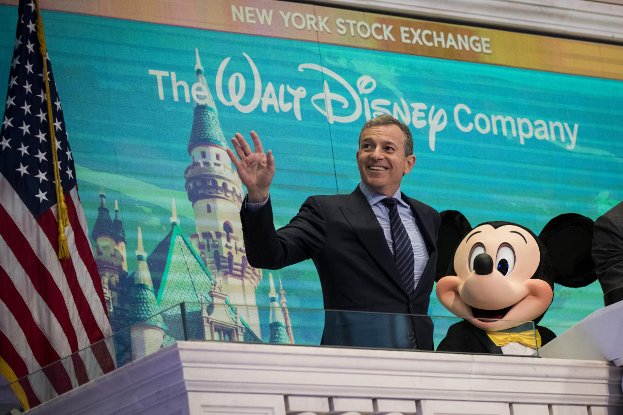 NEW YORK, NY - NOVEMBER 27: (L to R) Chief executive officer and chairman of The Walt Disney Company Bob Iger and Mickey Mouse look on before ringing the opening bell at the New York Stock Exchange (NYSE), November 27, 2017 in New York City. Disney is marking the company's 60th anniversary as a listed company on the NYSE. (Drew Angerer/Getty Images)