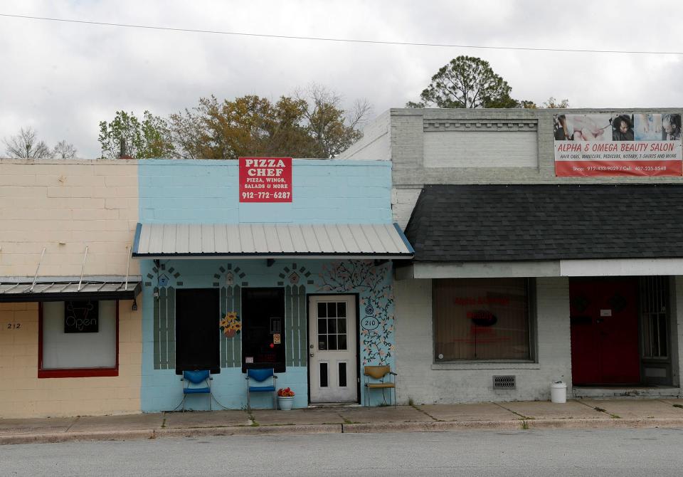 A mix of restaurants and store fronts in Guyton.