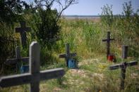The cemetery in Carcaliu , eastern Romania, supposedly the place where stolen paintings were buried by Olga Dogaru, mother of a Romanian suspect accused of stealing seven masterpieces from Rotterdam's Kunsthal museum, on August 7, 2013